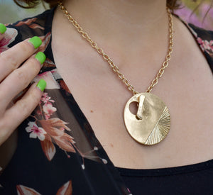 Robert Lee Morris Soho Hammered Brushed Gold Circle Pendant Toggle Necklace